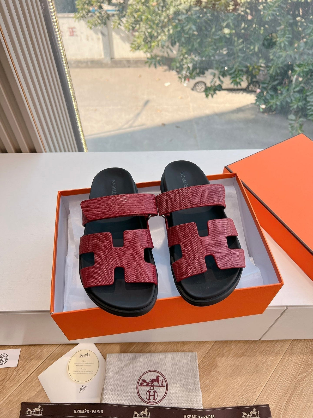 HERMES CHYPRE SANDAL IN CURRANT RED SHINY GRAINED CALFSKIN